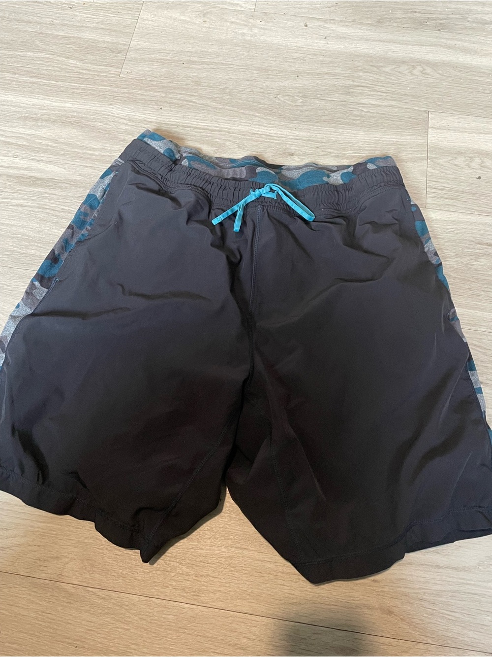 Fabletics Men's Black Shorts with Blue Accent Drawstring